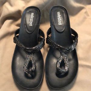 Pair of black Unlisted sandals